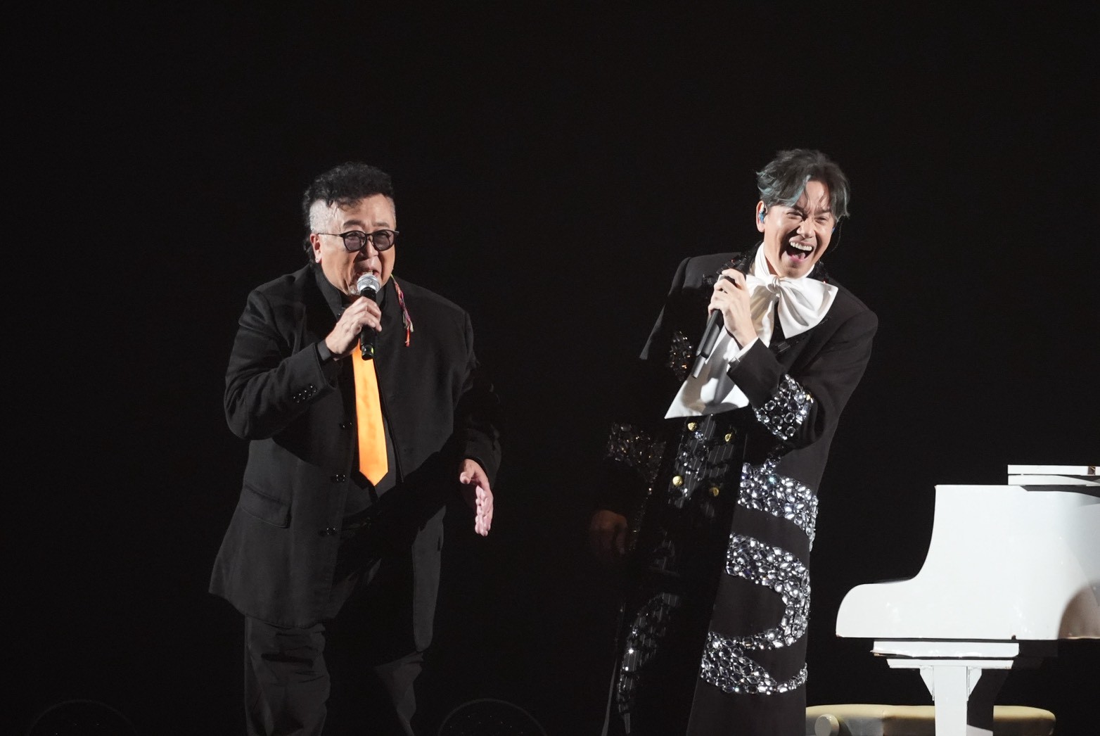 李聖傑（右）感謝鮑比達的教導。（圖／記者陳明中攝）