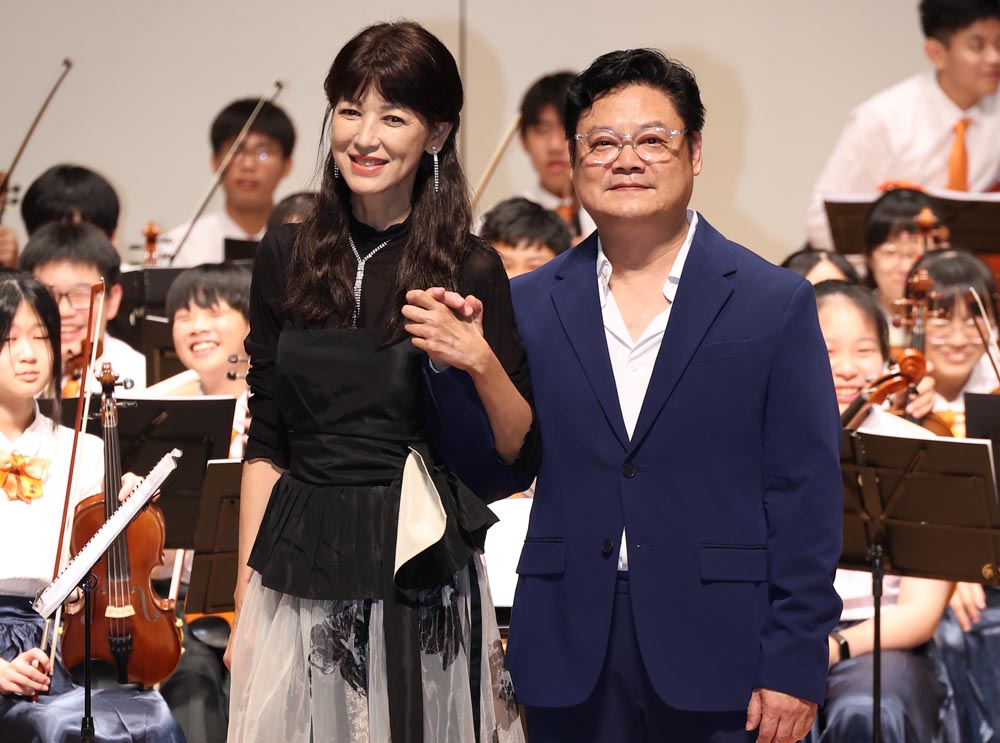 陳明真（左）和季忠平結婚15年。（圖／娛樂中心攝）