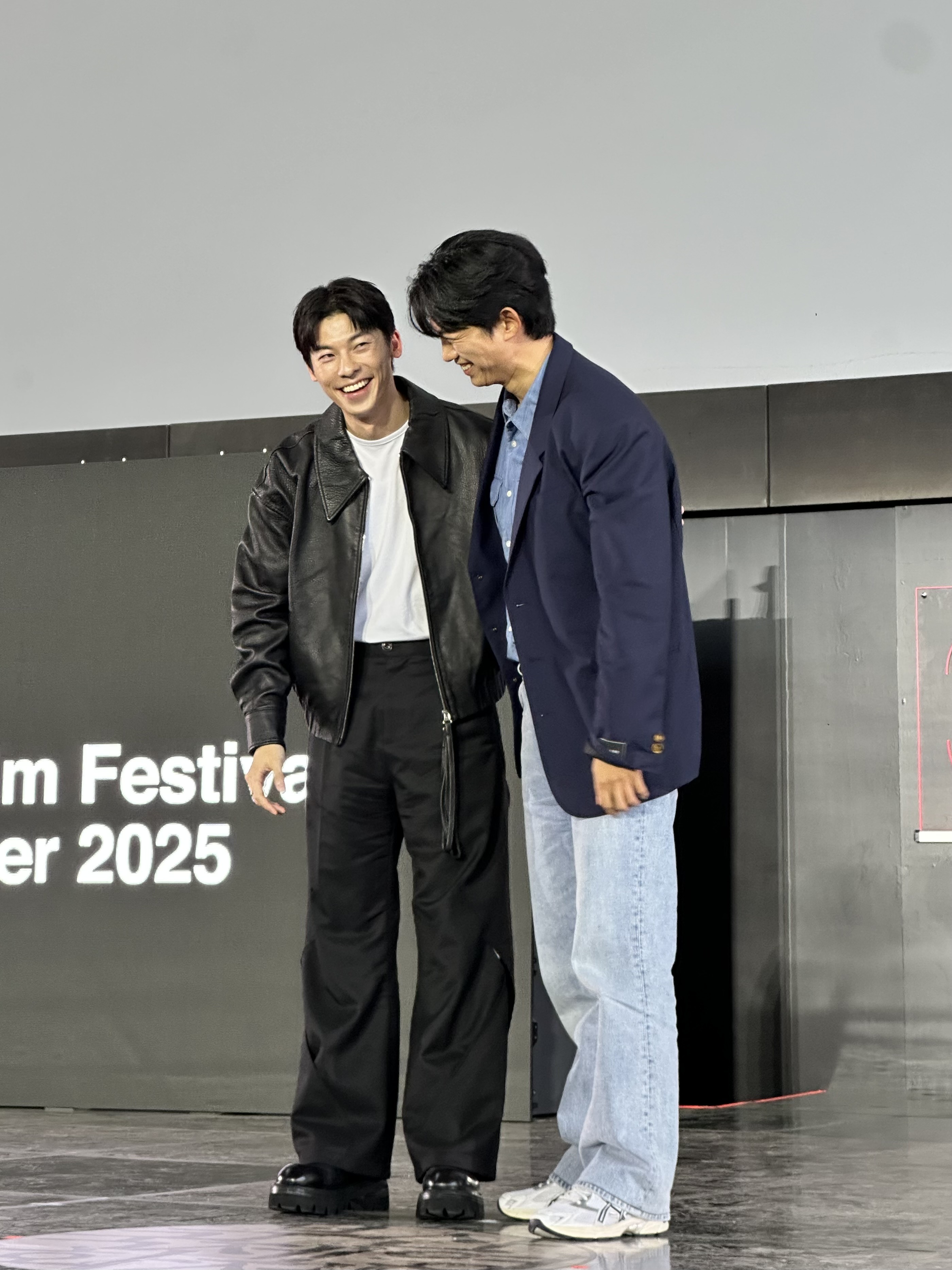 玉澤演（右）和許光漢互相客氣。（圖／記者蔡依庭攝）