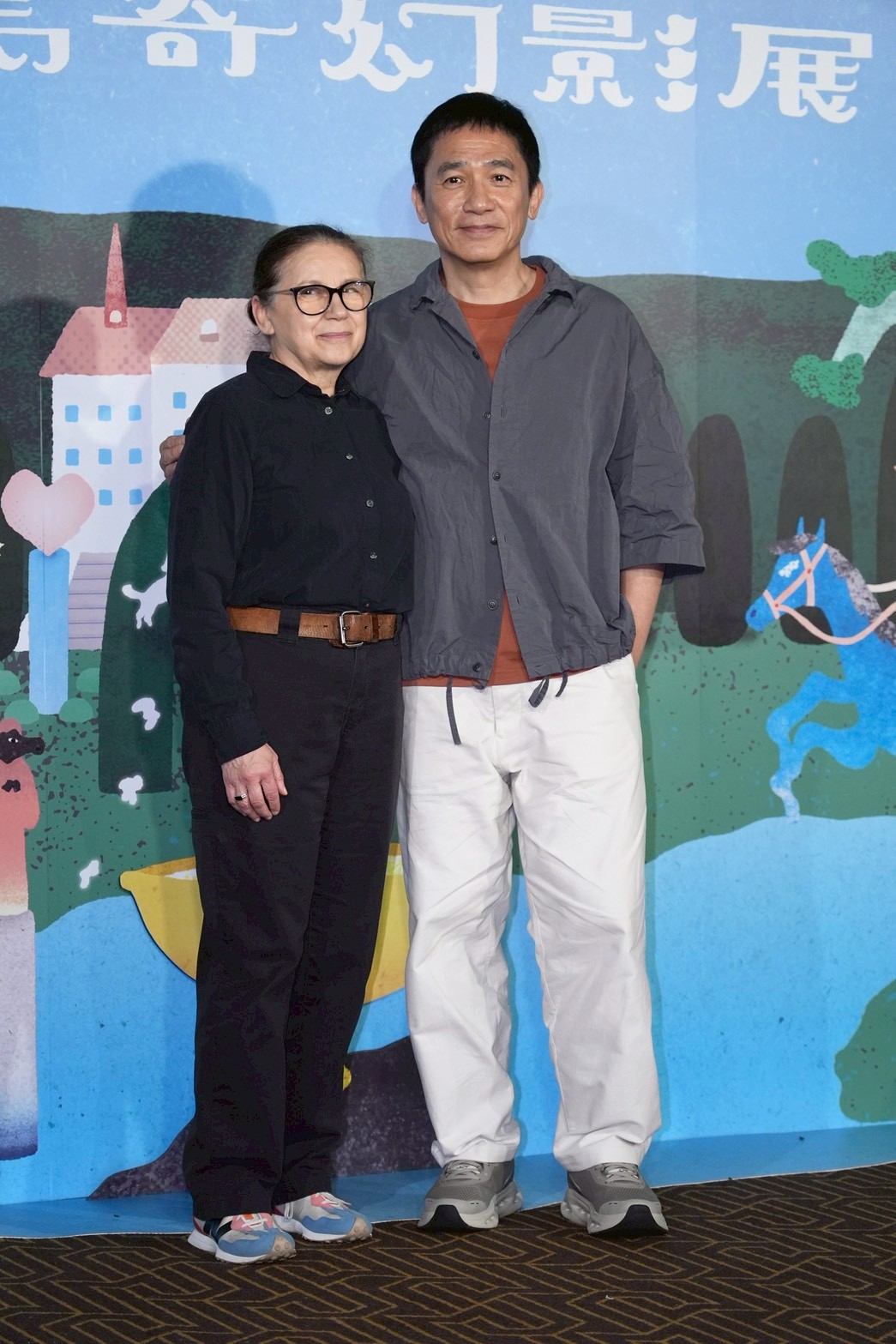 梁朝偉（右）和導演伊爾蒂蔻恩伊達晚上11點還要上班。（圖／記者許方正攝）