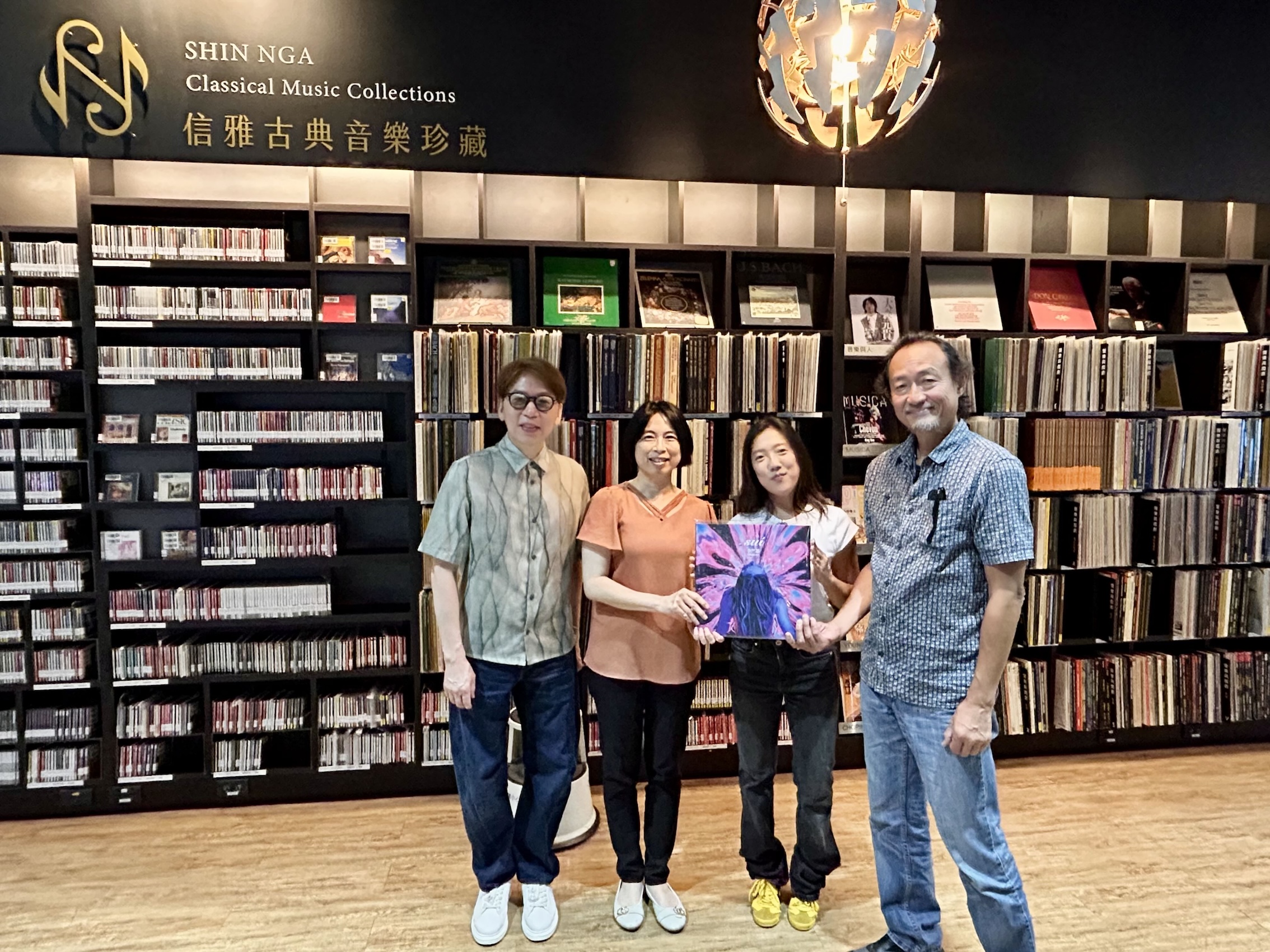 洪敬堯（左起）、臺南市立圖書館館長楊馥菱、李竺芯、鍾興民。（圖／臺南市立圖書館提供）