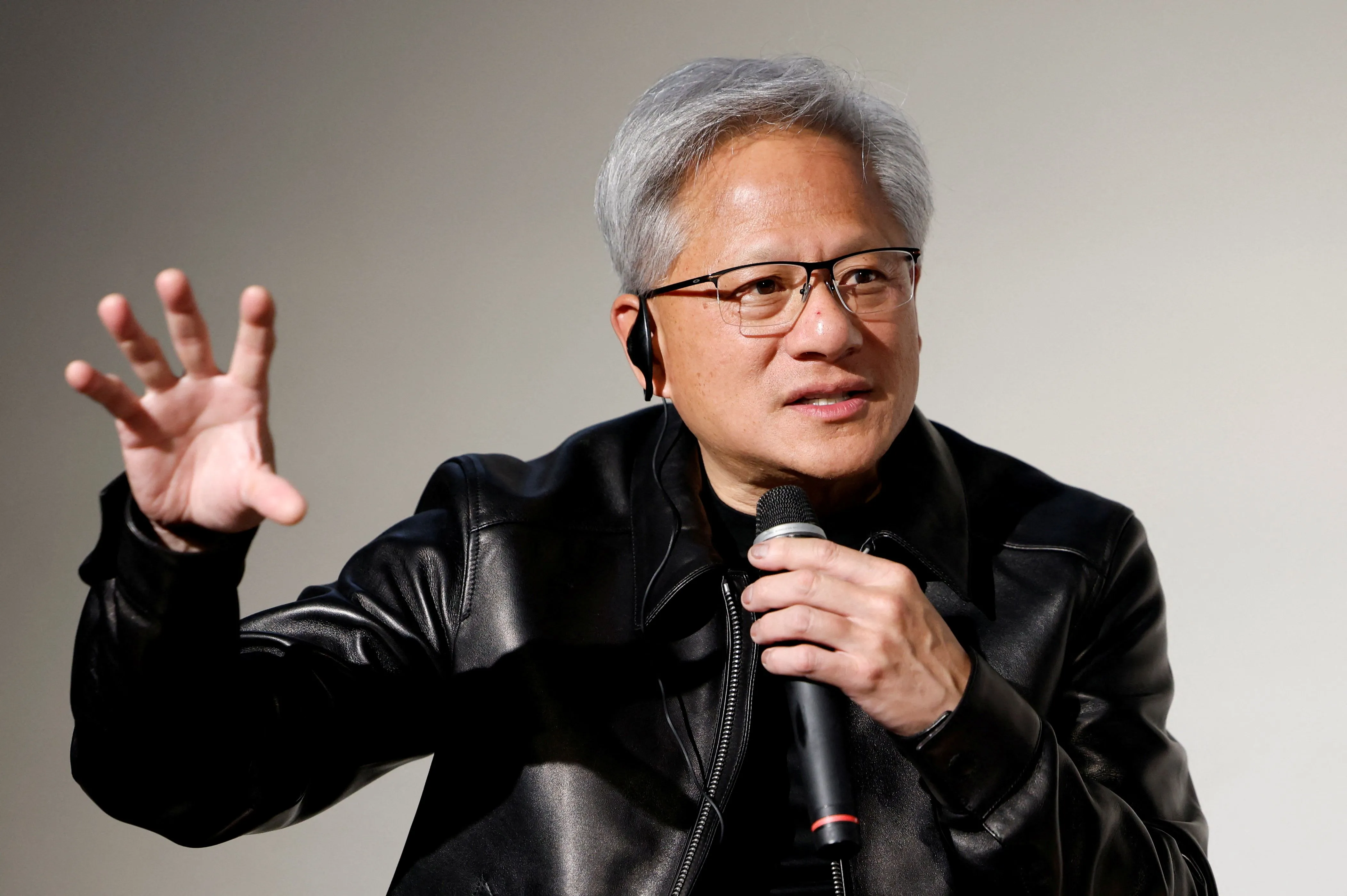 (黃仁勳認為,華爾街與美國政府對AI發展存在誤判。/路透社提供)